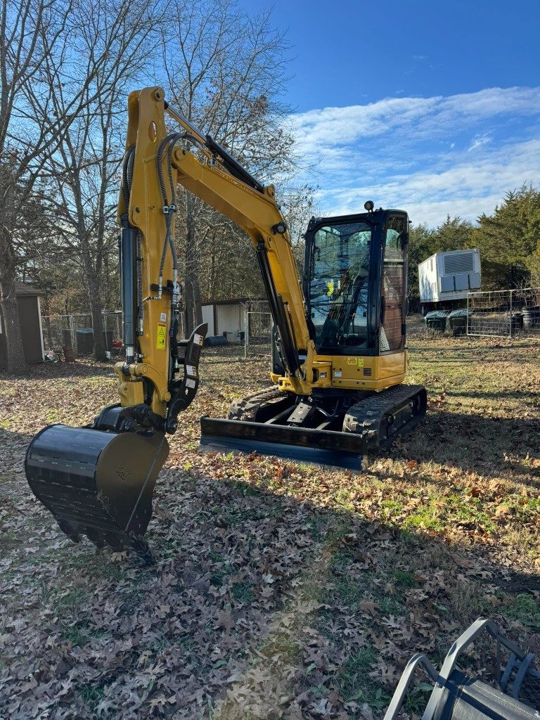 McGlothlin Services excavator on a Southwest Missouri job site